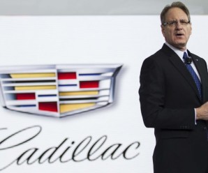 landscape-1439470932-johan-de-nysschen-with-cadillac-logo-e1421951154785